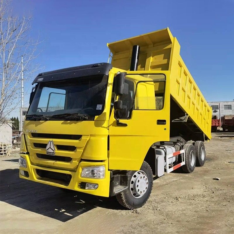 ABS Sí Sinotruck totalmente renovado Howo 371hp 8x4 24 metros cúbicos neumático de camión de descarga de tiradores 12.00R20