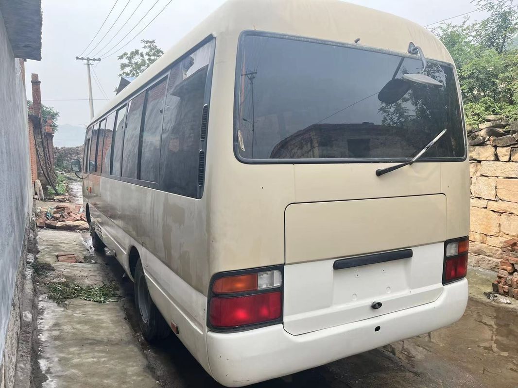 Capacidad del motor 4L Toyota Coaster 30 asientos Dirección izquierda Autobuses usados LHD para turistas