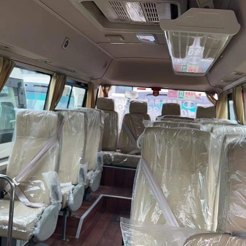 Velocidad máxima 100 km/h Toyota Coaster Bus 20-23 asientos con motor de gasolina de segunda mano