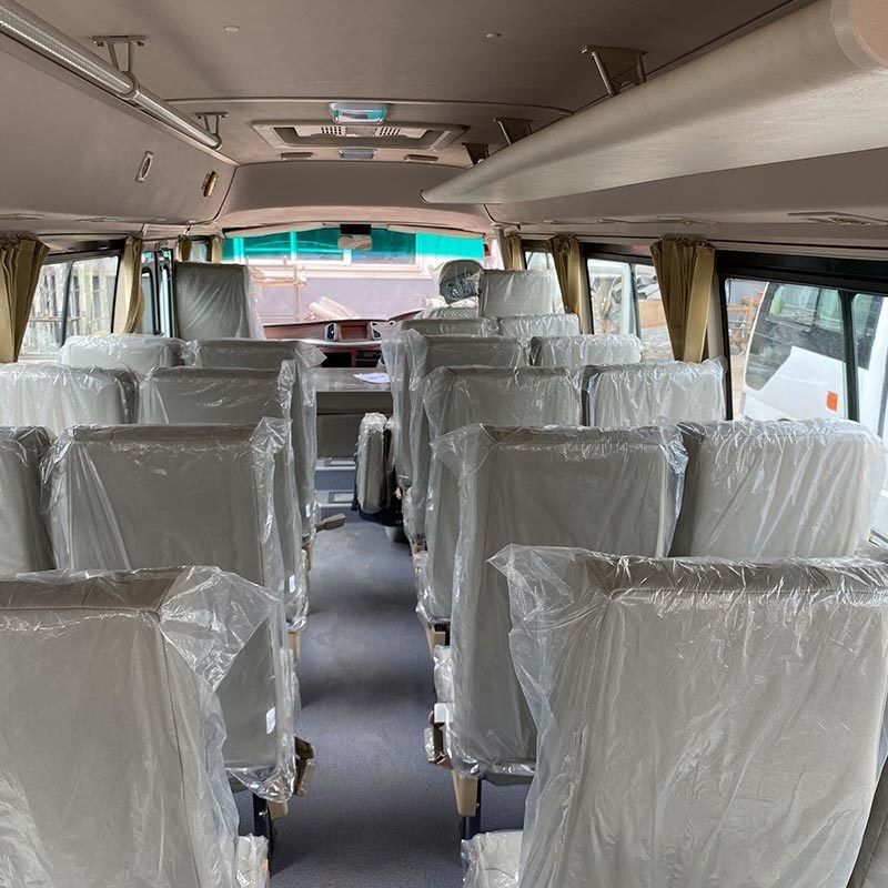 Velocidad máxima 100 km/h Furgoneta de pasajeros 31 asientos minibus para el transporte de eventos