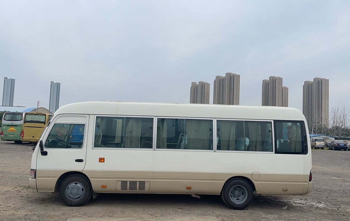 11Autobús turístico de lujo de 30 asientos Toyota Coaster de diesel usado para turismo