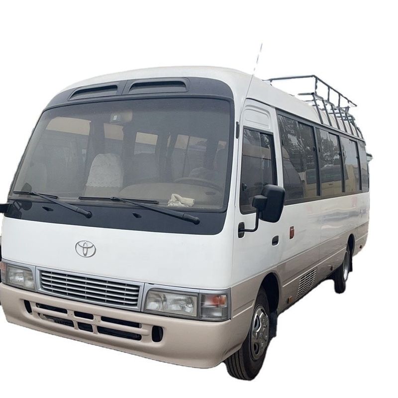 Buen estado 30 asientos Toyo ta Coaster Bus usado para transmisión Manual de tipo