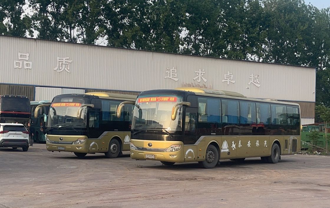 El stock de autobuses turísticos LHD de 65 plazas con norma de emisiones Euro 3 y suspensión de resorte de hoja