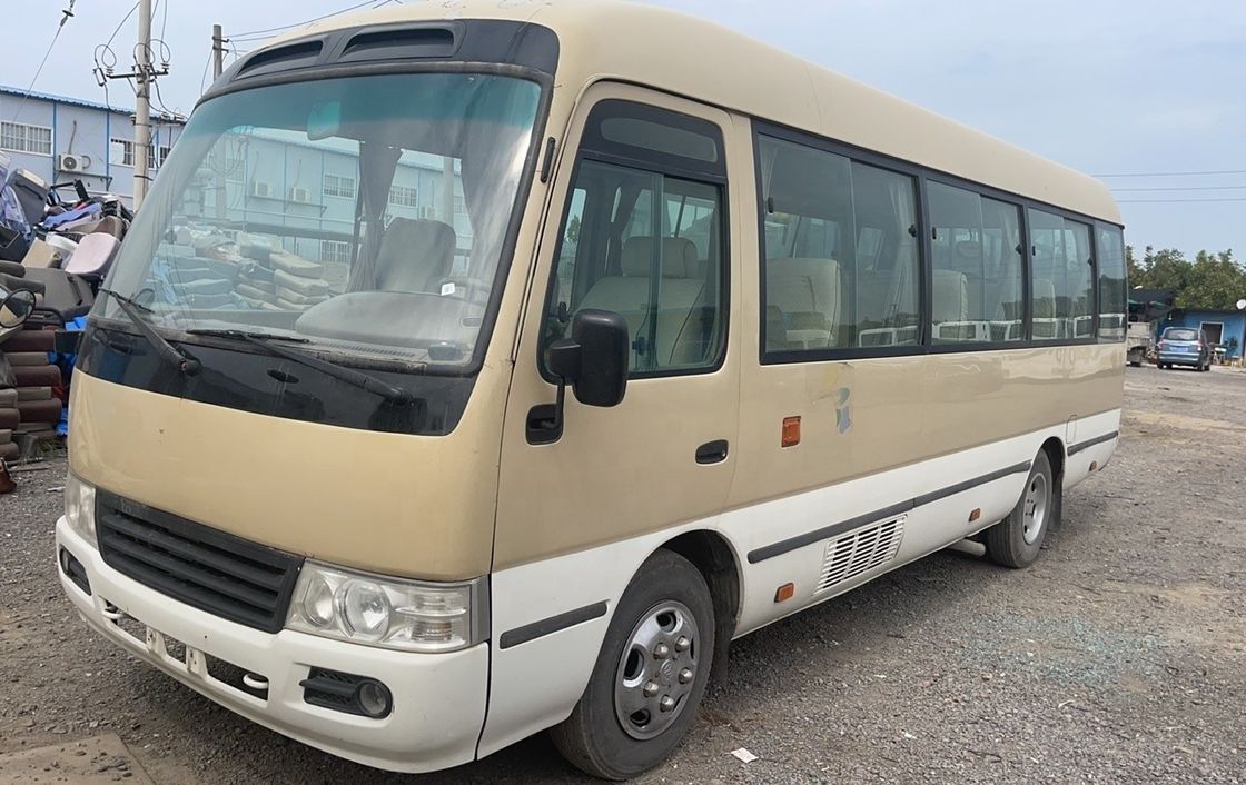 Autobús de 30 asientos usado Toyo Ta Coaster con capacidad de motor de 6-8L y potencia máxima de 113/5200kw