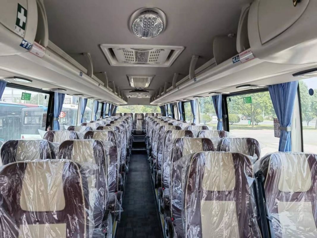 65 1 1 Con capacidad de asientos Motor diesel Autobús turístico para África Diseño y tanque de combustible de 600L